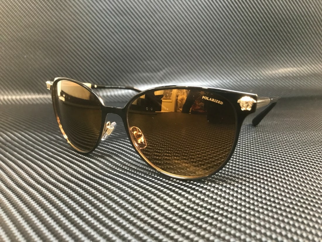 Versace VE2168 13772T Matte Black Cat Eye Polarized Sunglasses: Versace VE2168 13772T Matte Black Cat Eye Polarized Sunglasses Elevate your style with these stunning Versace VE2168 13772T sunglasses. Featuring a chic cat-eye design, these polarized sunglasses are