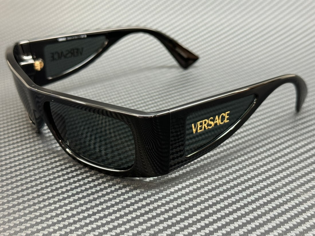 VERSACE VE4482 GB1 87 Black Grey Men's Sunglasses with Authenticity: VERSACE VE4482 GB1 87 Black Grey Men's Sunglasses with Authenticity Elevate your eyewear collection with these stylish Versace VE4482 GB1 87 sunglasses. Featuring a sleek black frame, these sunglasses