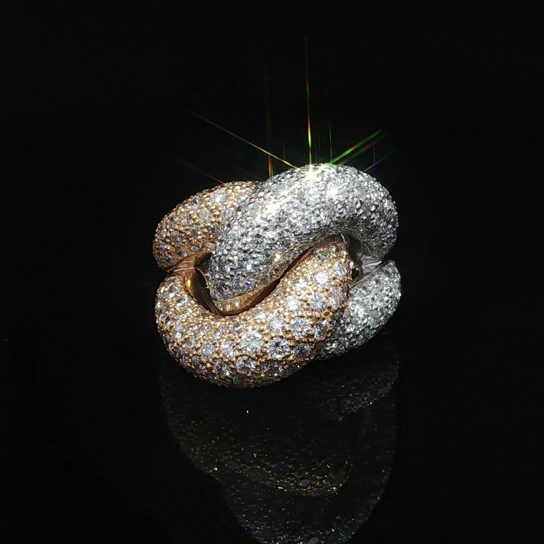 Solid 17-18K Gold 5.60ctw Pave Diamond Knot Link Ring: Solid 17-18K Gold 5.60ctw Pave Diamond Knot Link Ring Elevate your style with this exquisite Solid Gold High Quality 5.60ctw Pave Diamond Big Knot Link Interlocking Ring. Designed as a stunning cockta