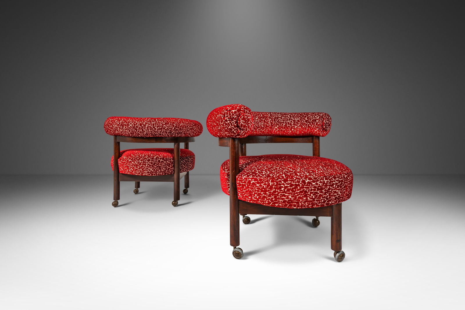 Rare Set of 2 Mid-Century Modern Walnut Lounge Chairs After Nanna Ditzel: Rare Set of 2 Mid-Century Modern Walnut Lounge Chairs After Nanna Ditzel This exquisite set of two Mid-Century Modern barrel back lounge chairs is crafted from solid black walnut, showcasing stunning