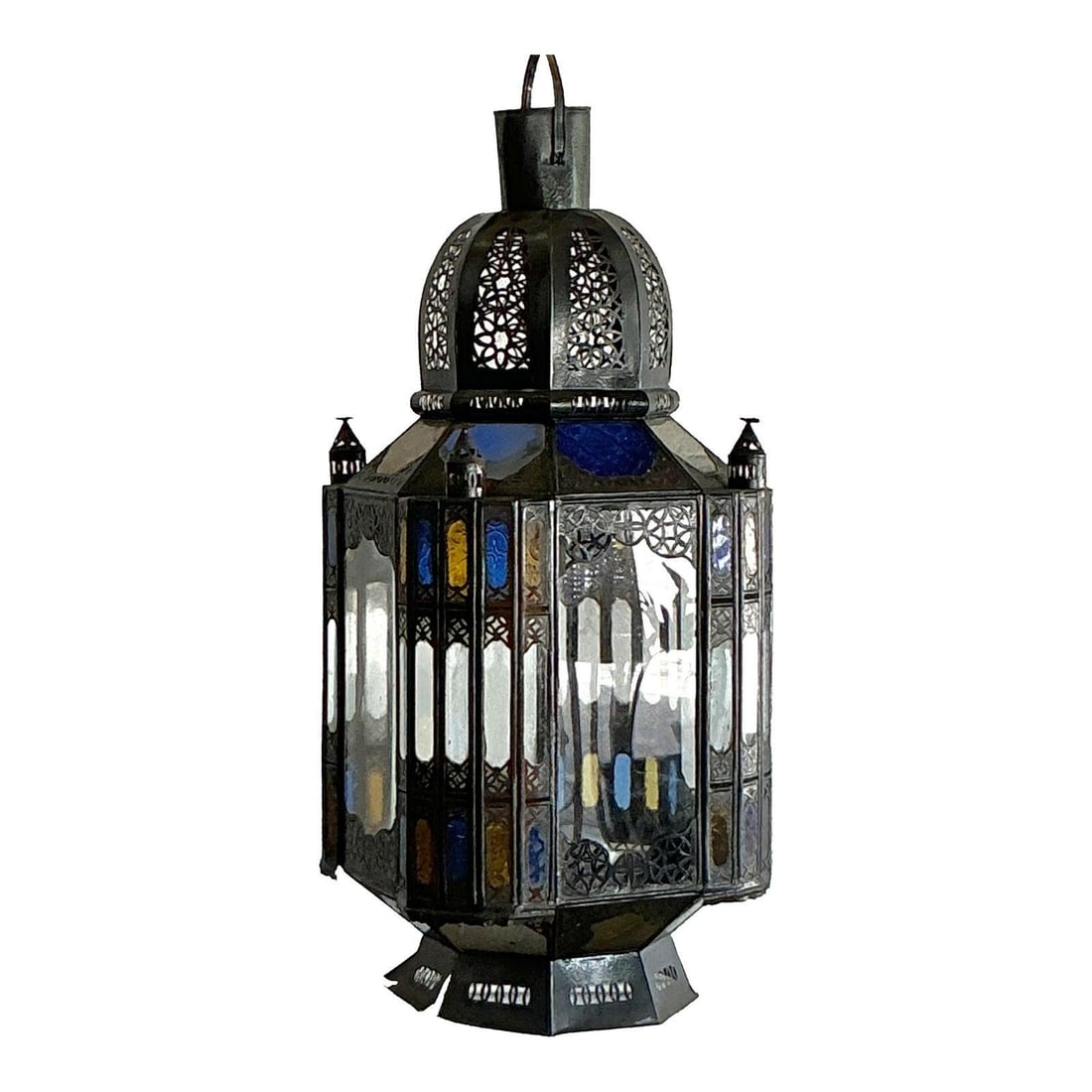 Exquisite Vintage Moroccan Lantern with Punch Cut Design: Exquisite Vintage Moroccan Lantern with Punch Cut Design Elevate your interior with this enchanting vintage Moroccan lantern, a stunning blend of artisanal craftsmanship and exotic design. The dark-to