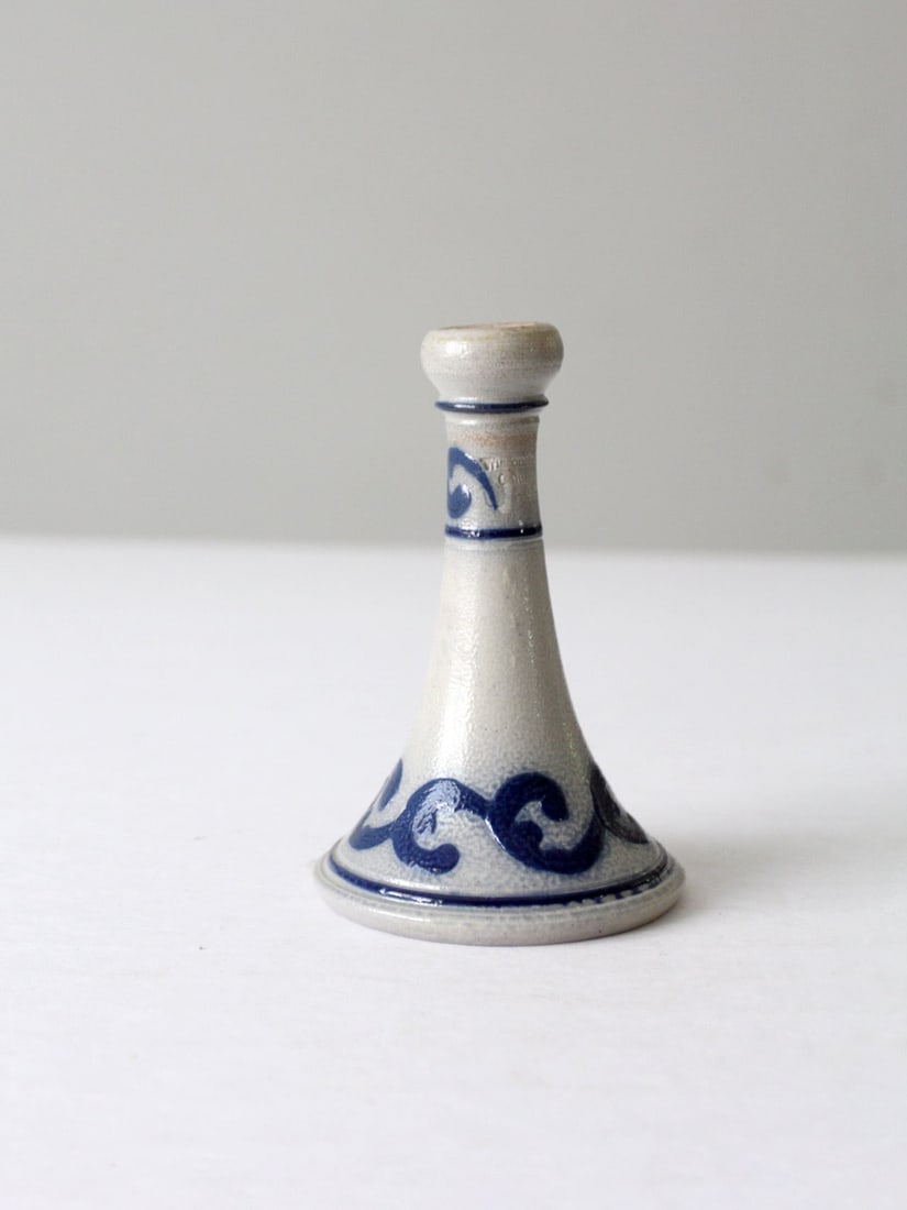 Vintage Wisconsin Pottery 1991 Salt Glaze Candlestick Holder: Vintage Wisconsin Pottery 1991 Salt Glaze Candlestick Holder This vintage candlestick holder from Wisconsin Pottery, dated 1991, features a beautiful swirling design with a salt glaze finish. It is in