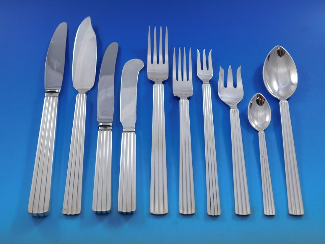 Georg Jensen Bernadotte Sterling Silver Flatware Set 135 pcs with Storage Chest: Georg Jensen Bernadotte Sterling Silver Flatware Set 135 pcs with Storage Chest Discover the elegance of the Bernadotte flatware set by Georg Jensen, a stunning collection that showcases the artistry
