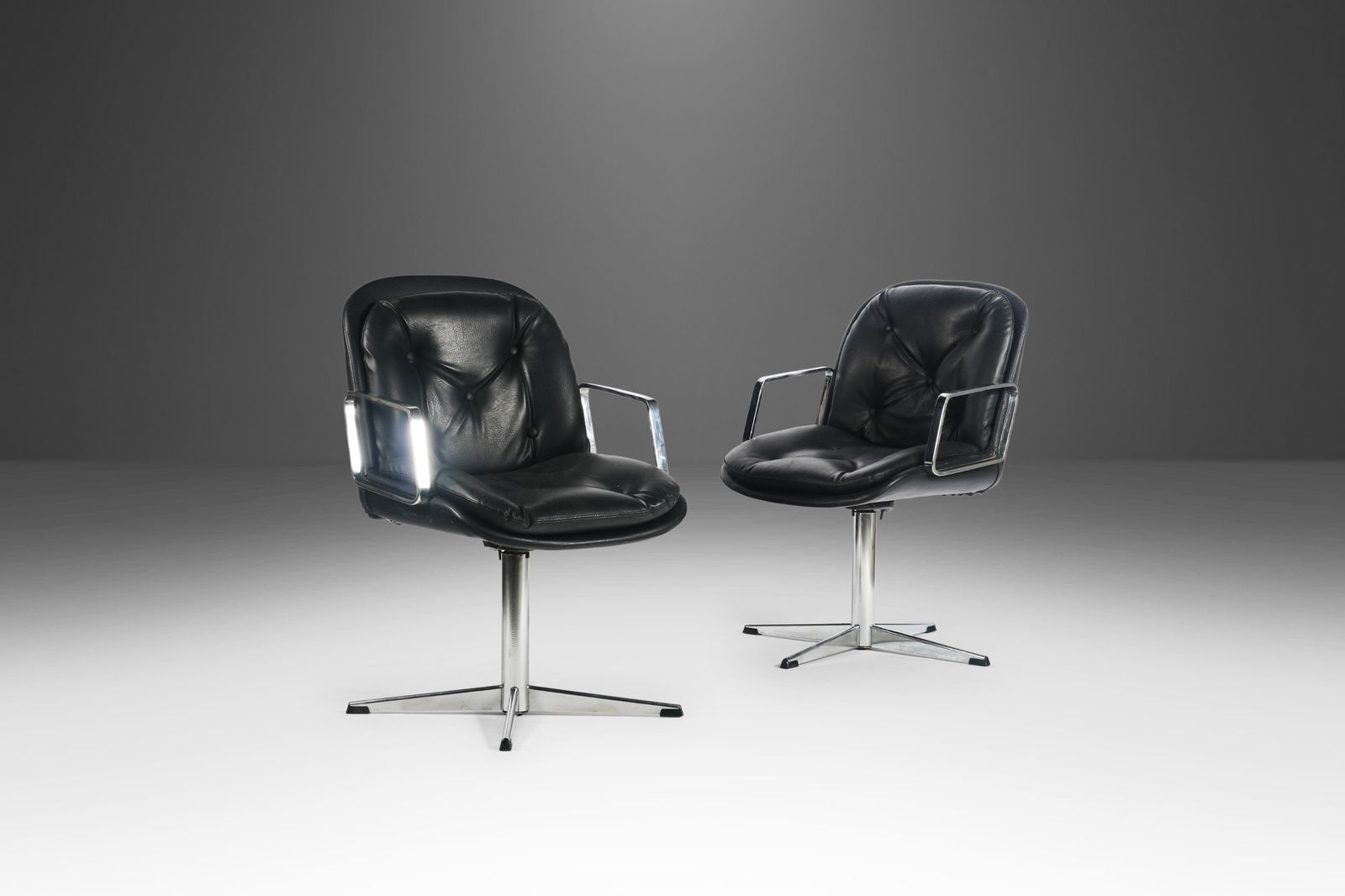 Mid-Century Modern Black Chrome Office Chairs Set of 2 USA 1960s: Mid-Century Modern Black Chrome Office Chairs Set of 2 USA 1960s This set of two high stance office chairs from the 1960s exemplifies Mid-Century Modern design. Crafted from durable steel with a strik