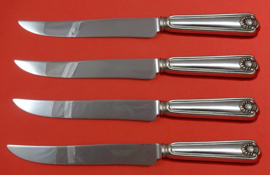 Frank Smith Fiddle Shell Sterling Silver Steak Knife Set 4-Piece Texas Sized: Frank Smith Fiddle Shell Sterling Silver Steak Knife Set 4-Piece Texas Sized Introducing the Fiddle Shell Steak Knife Set by Frank Smith, a stunning collection of flatware designed for those who appre