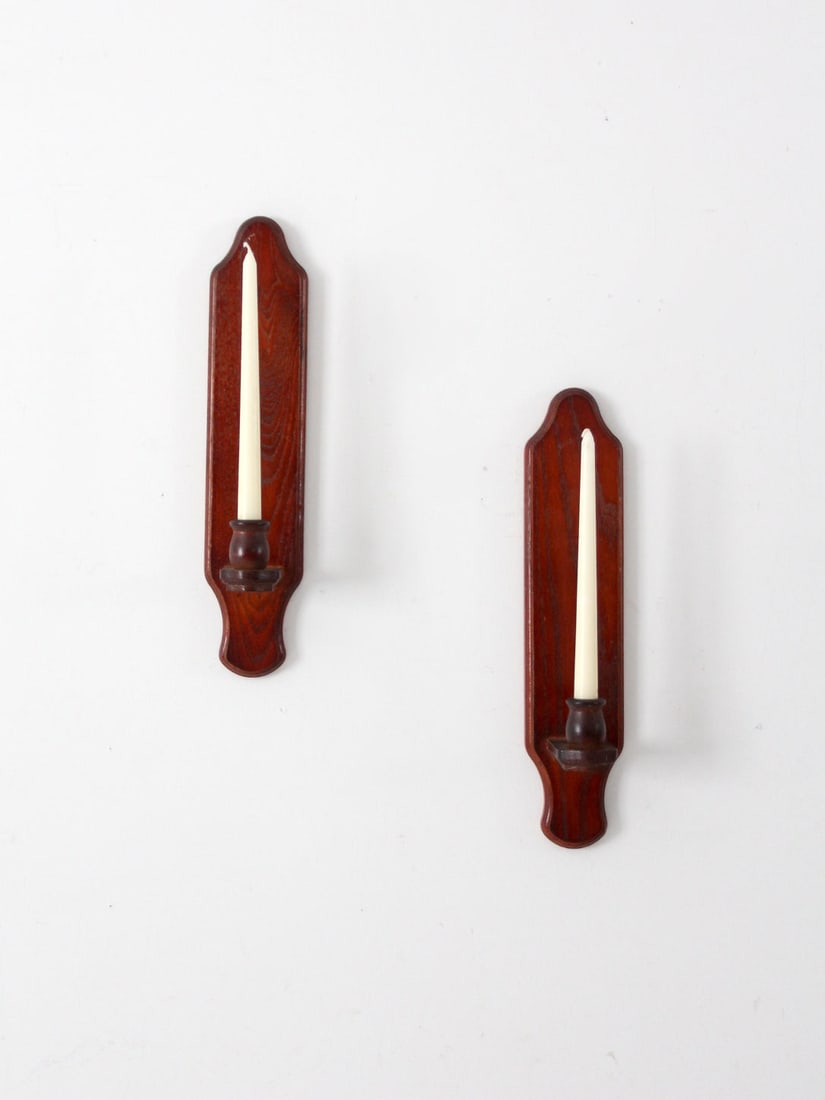 Charming Vintage Wooden Candlestick Wall Sconces Pair 16.25 Inch: Charming Vintage Wooden Candlestick Wall Sconces Pair 16.25 Inch Enhance your home decor with this charming pair of vintage wooden candlestick wall sconces. These handmade candle mounts showcase a war