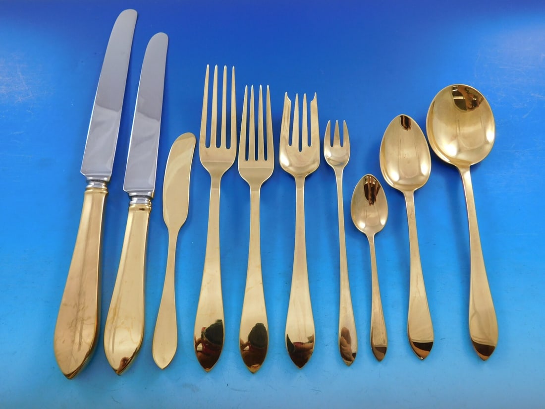 Tiffany Faneuil Gold Vermeil Sterling Silver Flatware Set 133 pcs: Tiffany Faneuil Gold Vermeil Sterling Silver Flatware Set 133 pcs This exquisite Faneuil Gold flatware set by Tiffany & Co. showcases a timeless Mid-Century Modern design, crafted from high-quality st