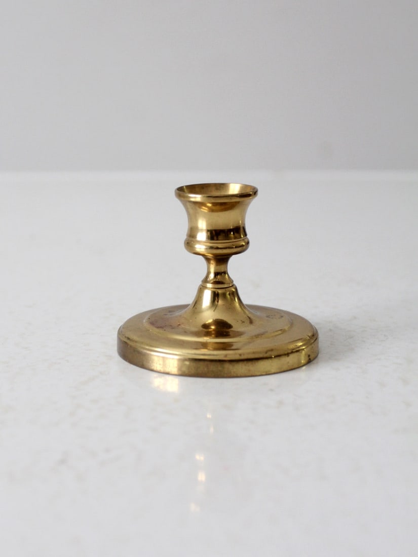 Vintage Brass Taper Candlestick Holder 3.375 Inch Diameter: Vintage Brass Taper Candlestick Holder 3.375 Inch Diameter Add a touch of vintage charm to your decor with this brass candlestick holder. Designed to hold a standard taper, this piece features a class