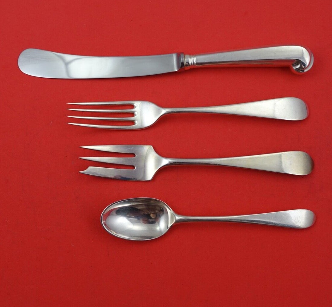 James Robinson Irish Rib Sterling Silver 4-Piece Flatware Set: James Robinson Irish Rib Sterling Silver 4-Piece Flatware Set This exquisite 4-piece sterling silver setting features the elegant Irish Rib pattern by renowned maker James Robinson. The set includes a