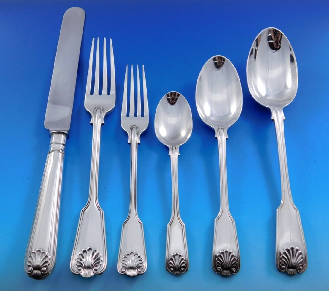 James Robinson Fiddle Thread & Shell 48 Piece Sterling Silver Flatware Set: James Robinson Fiddle Thread & Shell 48 Piece Sterling Silver Flatware Set This exquisite Fiddle Thread & Shell flatware set by James Robinson is crafted from high-quality sterling silver, showcasing