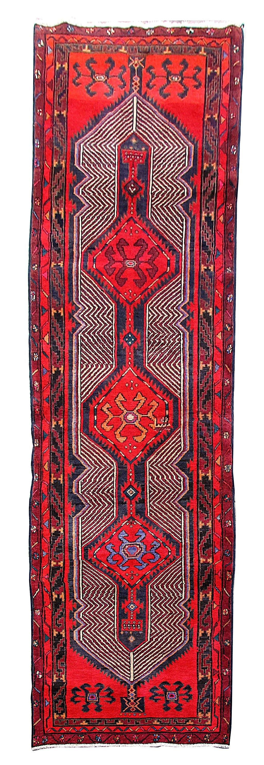 Handmade 3.6 x 13.4 Red Persian Ardebil Wool Runner Rug: Handmade 3.6 x 13.4 Red Persian Ardebil Wool Runner Rug This exquisite handmade Persian Ardebil wool runner rug is a stunning addition to any space. Handcrafted by skilled artisans in the historic cit