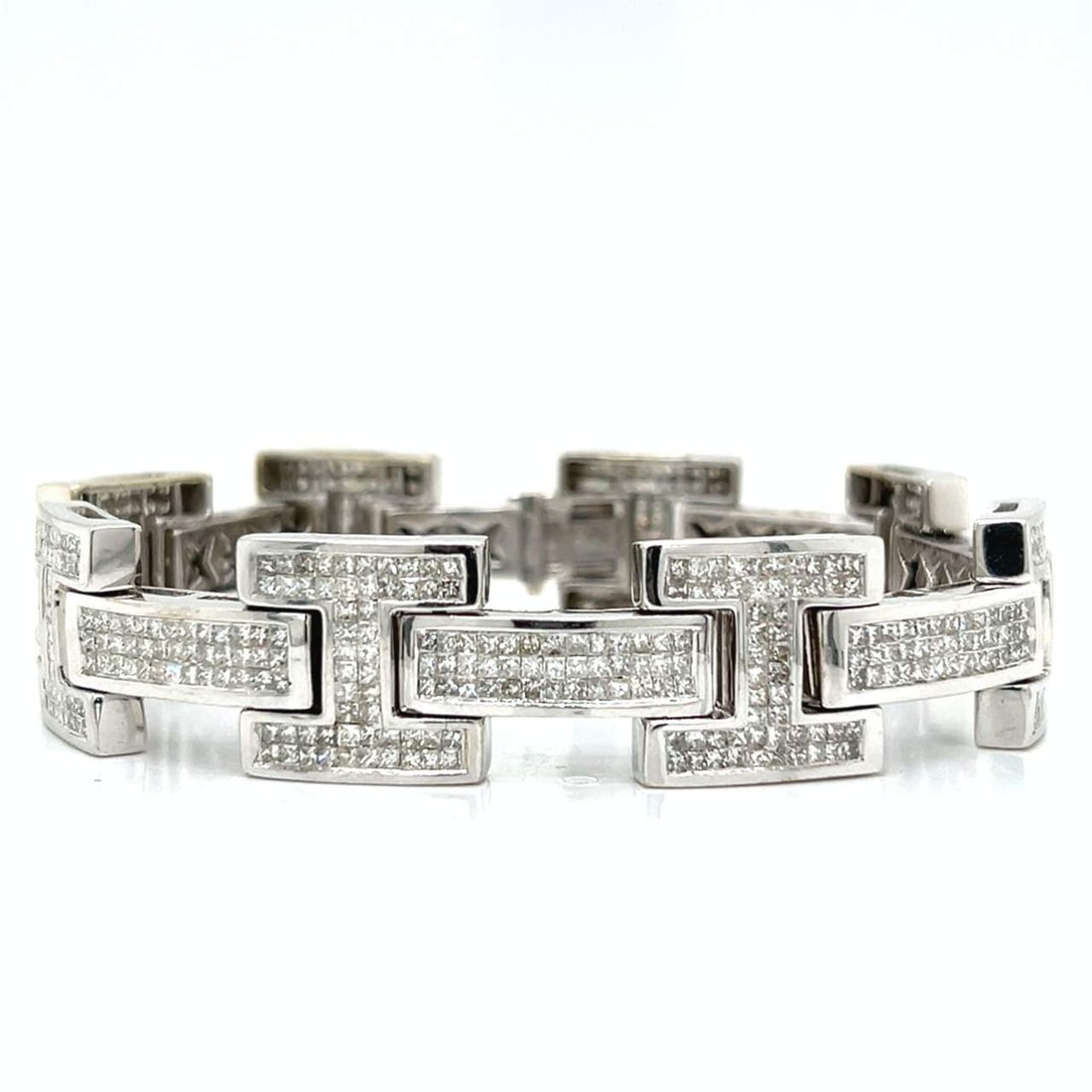 14K White Gold JBO Signed 15.00 Ct Princess-cut Diamond Bracelet: 14K White Gold JBO Signed 15.00 Ct Princess-cut Diamond Bracelet This stunning bracelet features 14K white gold and is adorned with 734 invisibly-set princess-cut diamonds, totaling approximately 15.0