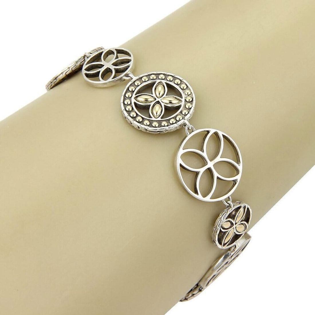 John Hardy Kawung 18k Gold Sterling Silver Floral Bracelet: John Hardy Kawung 18k Gold Sterling Silver Floral Bracelet The John Hardy Kawung 18k & Sterling Silver Round Link Floral Bracelet is a luxurious vintage piece that beautifully combines intricate flora