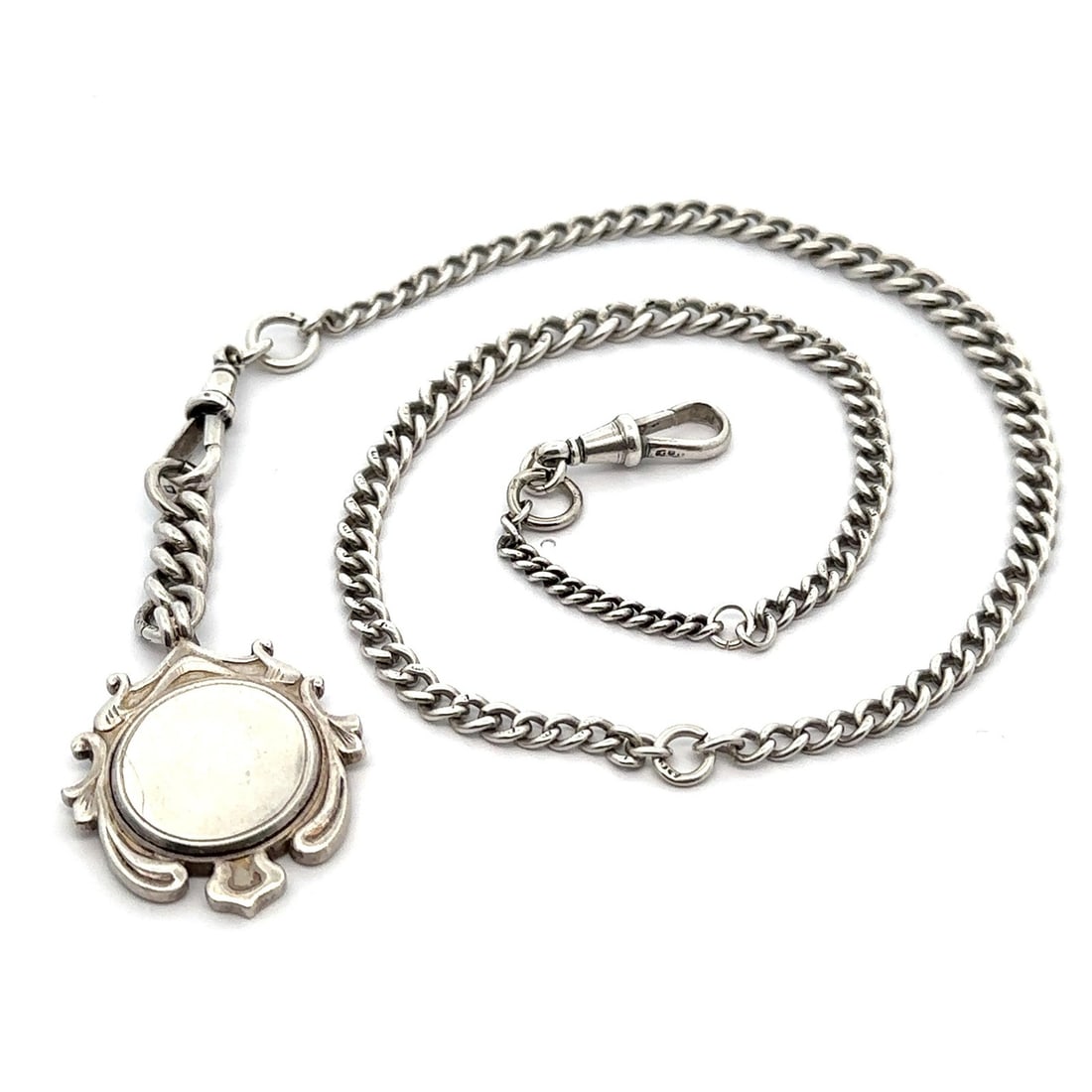 Vintage Sterling Silver Pocket Wallet Chain with Engraveable Charm: Vintage Sterling Silver Pocket Wallet Chain with Engraveable Charm This vintage pocket wallet chain is crafted from solid Sterling Silver (.925) and features a dangle engraveable charm along with two 