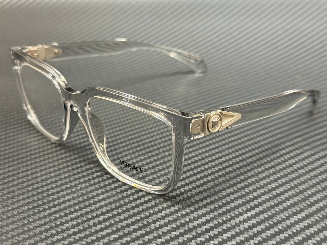 Versace VE3377U 5510 Transparent Silver 53mm Men's Eyeglasses with Authenticity: Versace VE3377U 5510 Transparent Silver 53mm Men's Eyeglasses with Authenticity Introducing the Versace VE3377U 5510 eyeglasses, a perfect blend of luxury and style for the modern man. These eyeglasse