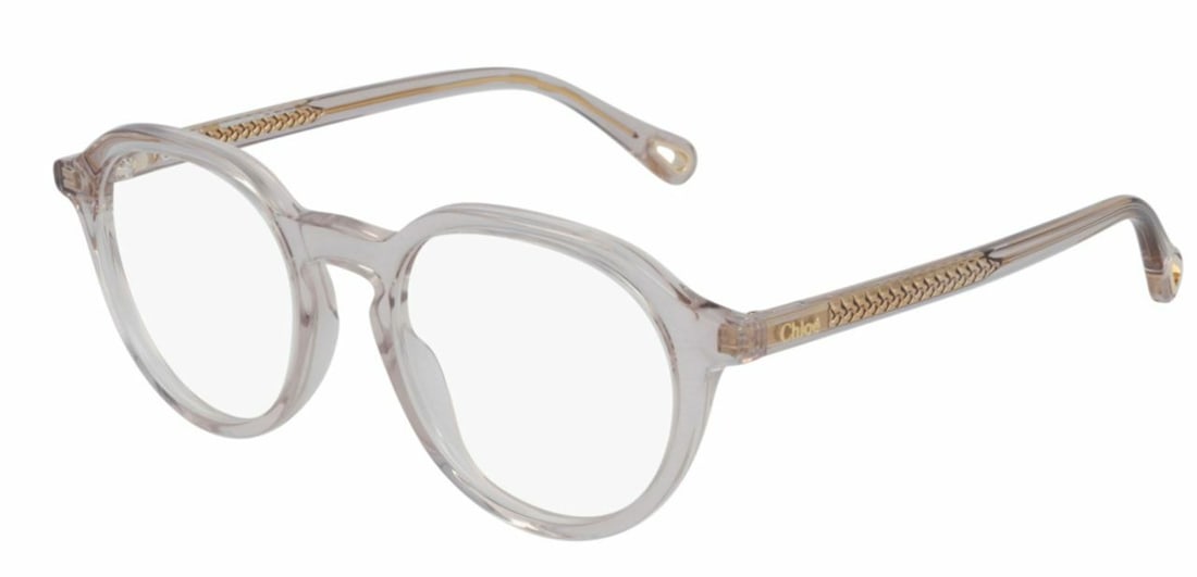 Chloe CH0012O 001 Women's Round Pink Transparent Eyeglasses with Case: Chloe CH0012O 001 Women's Round Pink Transparent Eyeglasses with Case Discover the elegance of Chloe CH0012O 001 eyeglasses, featuring a stylish round frame in a chic pink transparent color. These eye