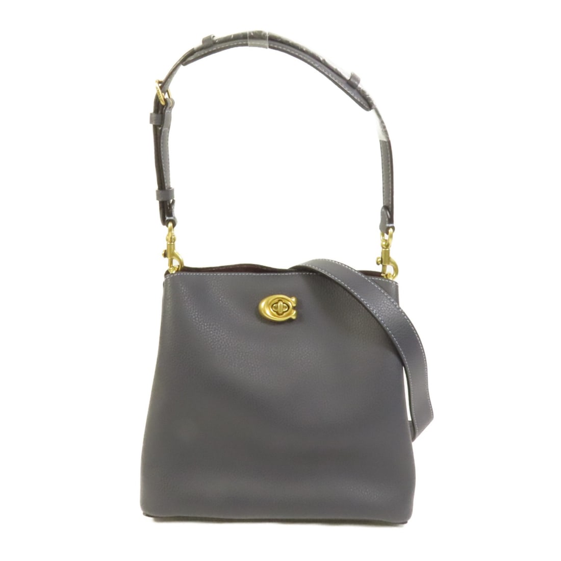 COACH Willow Bucket 2way Shoulder Bag Navy Calfskin Leather: COACH Willow Bucket 2way Shoulder Bag Navy Calfskin Leather Introducing the COACH Willow Bucket 2-way Shoulder Bag, a perfect blend of style and functionality. Crafted from premium calfskin leather, t