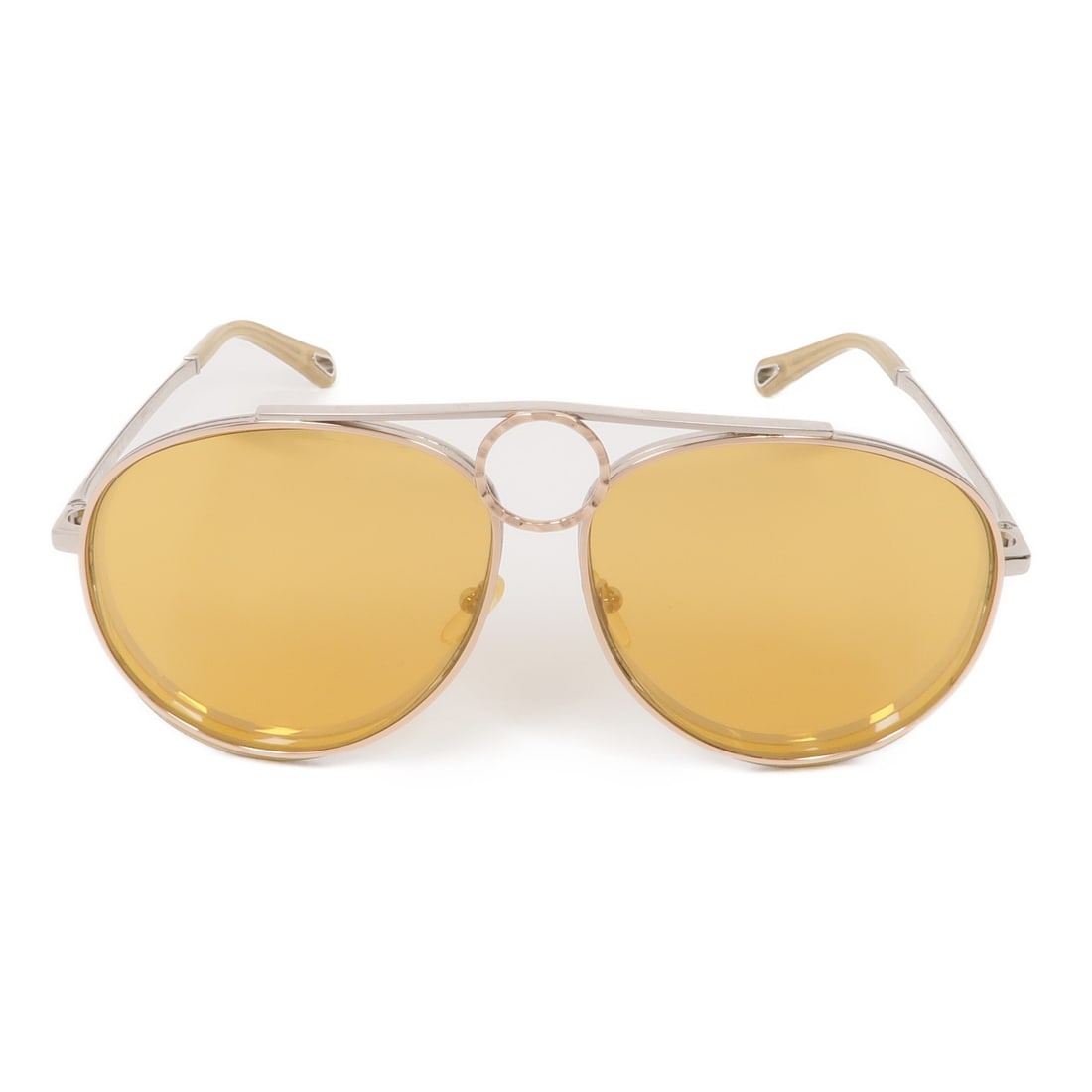 Chloe CE1145 Brown Metal Sunglasses Made in France: Chloe CE1145 Brown Metal Sunglasses Made in France These Chloe CE1145 sunglasses feature a stylish metal frame in a rich brown color, designed for a regular fit. Crafted in France, these sunglasses ar