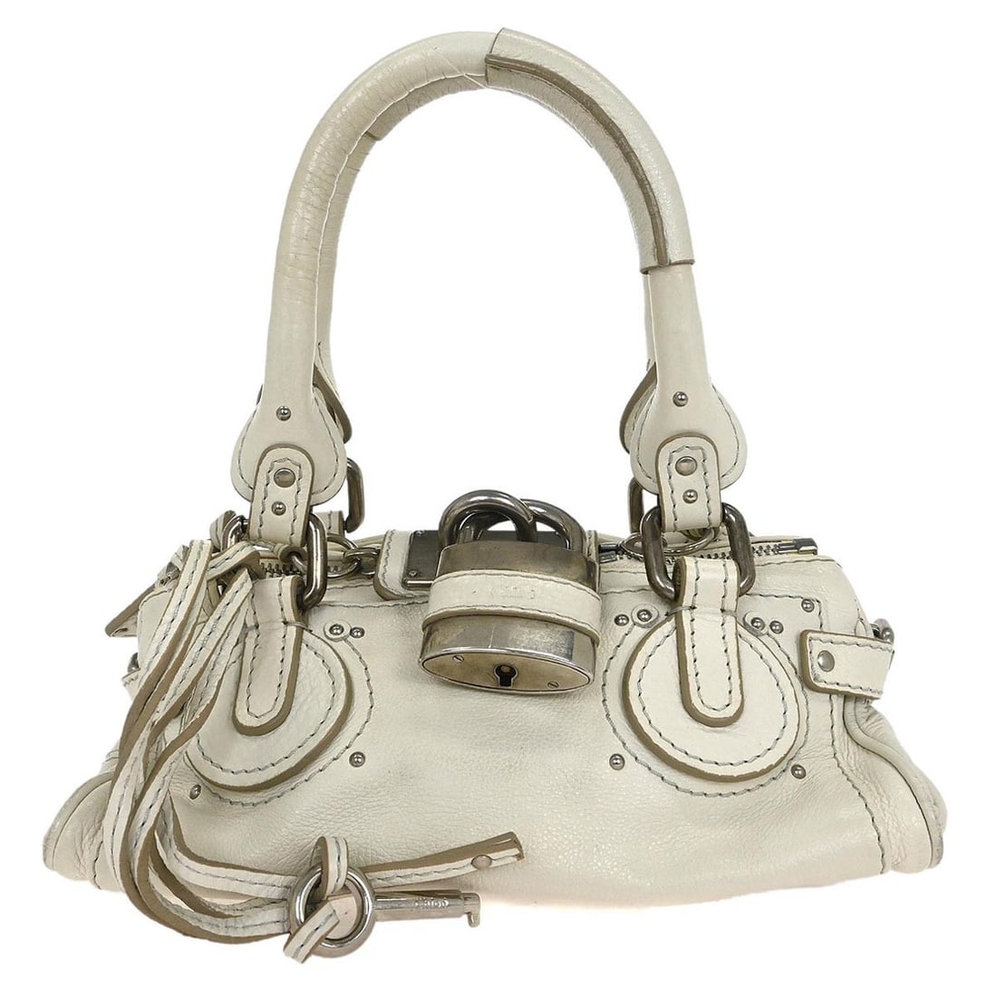 Chloe Paddington Mini Handbag White Leather Silver Hardware: Chloe Paddington Mini Handbag White Leather Silver Hardware Elevate your casual style with the Chloe White Paddington Mini Handbag. This chic top handle bag features a classic white leather exterior a