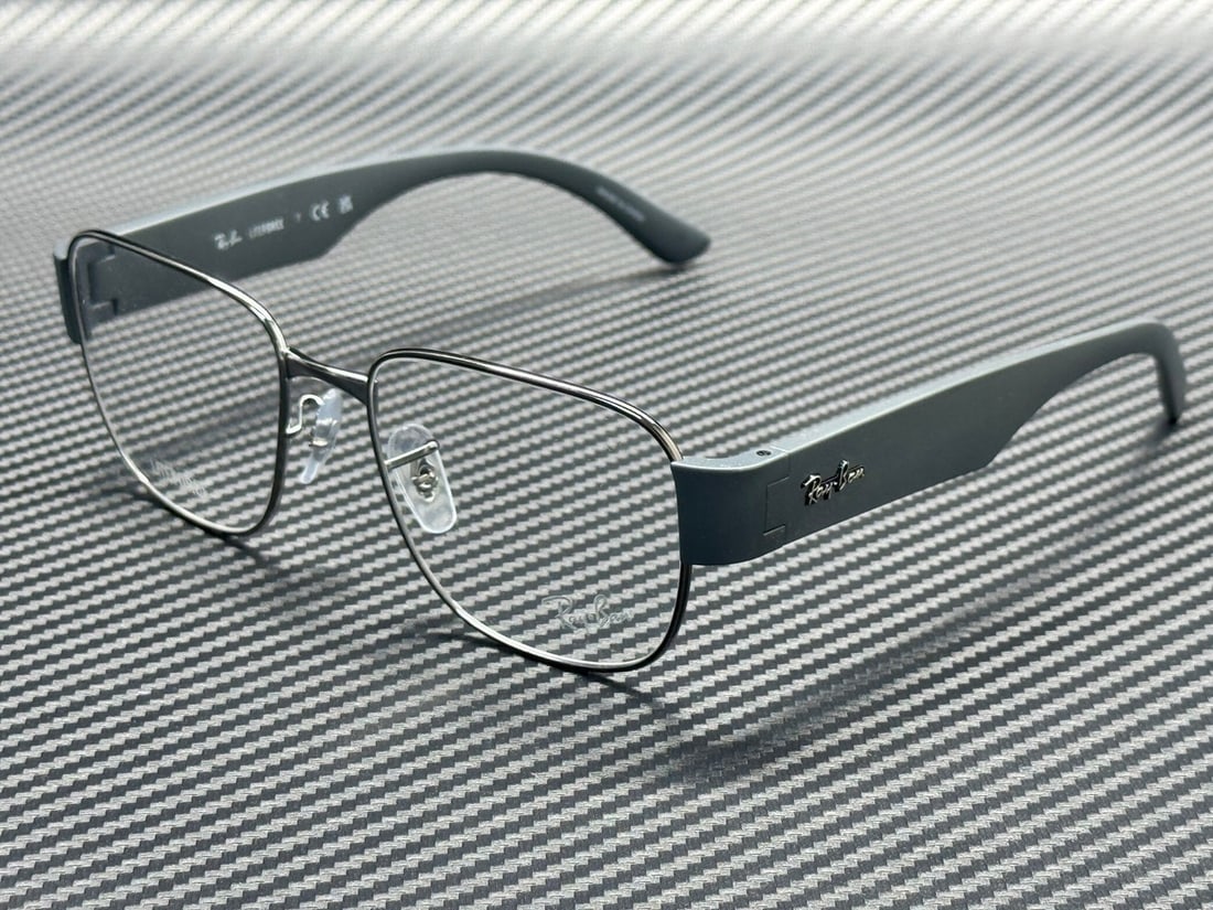 Ray-Ban RX6532 2502 Gunmetal 53mm Unisex Eyeglasses with Case: Ray-Ban RX6532 2502 Gunmetal 53mm Unisex Eyeglasses with Case Discover the stylish Ray-Ban RX6532 2502 eyeglasses, designed for a unisex fit. These frames feature a sophisticated gunmetal finish, perf