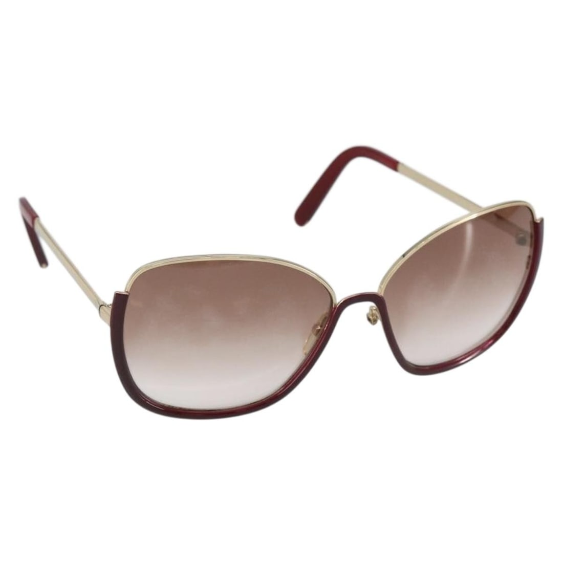 Chloe Gold Plastic Sunglasses CE116S Made in Italy: Chloe Gold Plastic Sunglasses CE116S Made in Italy Elevate your style with these Chloe sunglasses, crafted in Italy. Featuring a luxurious gold plastic frame, these sunglasses are designed for both fa