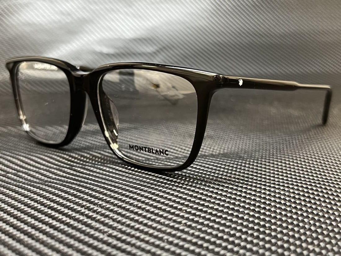 Montblanc MB0011OA 001 Black Square Eyeglasses 54mm Full Rim: Montblanc MB0011OA 001 Black Square Eyeglasses 54mm Full Rim Discover the elegance of Montblanc MB0011OA 001 Black Square Men's Eyeglasses. These stylish eyeglasses feature a classic square frame desi
