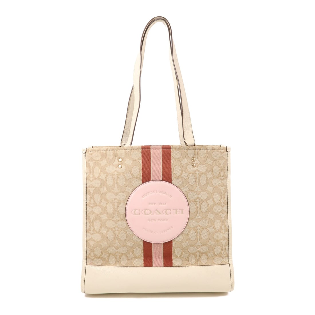 COACH Beige Canvas Shoulder Tote Bag Made in USA: COACH Beige Canvas Shoulder Tote Bag Made in USA This stylish COACH Shoulder Tote Bag is crafted from durable canvas in a classic beige hue. With dimensions of 12.0 in (L) x 4.9 in (D) x 11.4 in (H),