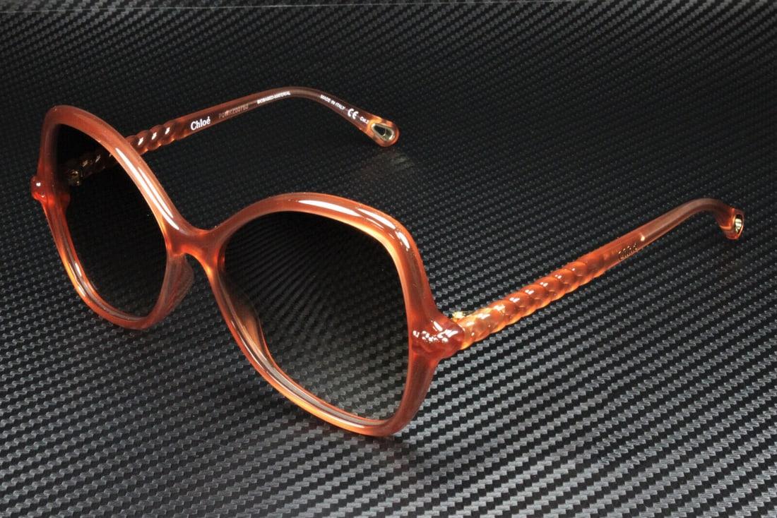 Chloe CH0001S 003 Pink Cat Eye Sunglasses with Brown Gradient Lenses: Chloe CH0001S 003 Pink Cat Eye Sunglasses with Brown Gradient Lenses Elevate your style with these chic Chloe CH0001S 003 Pink Cat Eye Sunglasses. Featuring a fashionable cat-eye frame in a vibrant pi