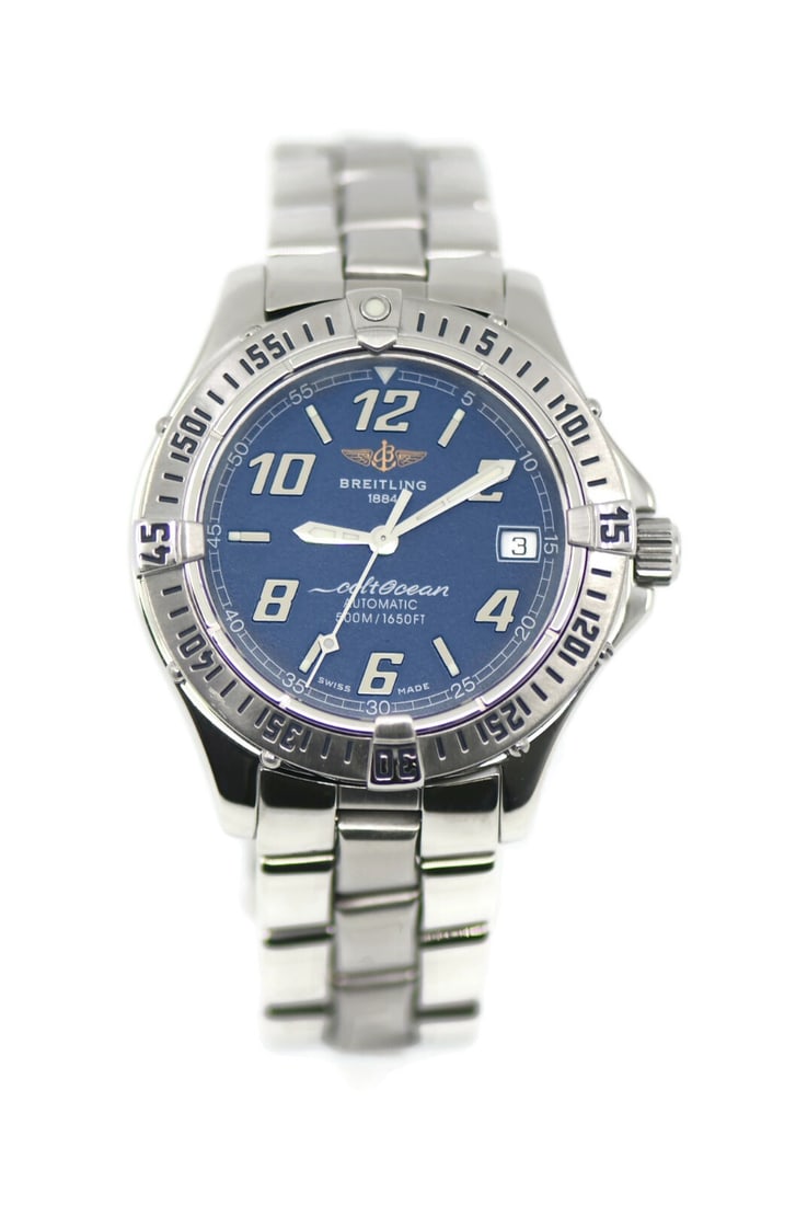 Breitling Colt A17350 Stainless Steel Automatic Watch Blue Dial: Breitling Colt A17350 Stainless Steel Automatic Watch Blue Dial Introducing the Breitling Colt A17350, a sophisticated wristwatch that combines precision with style. This timepiece features a robust s