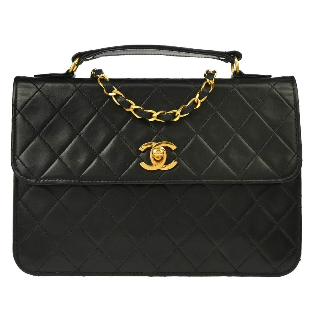 Chanel Black Lambskin 2-Way Top Handle Handbag: Chanel Black Lambskin 2-Way Top Handle Handbag This exquisite Chanel 2-way handbag is crafted from luxurious black lambskin, making it a timeless addition to your casual attire. Featuring a stylish to