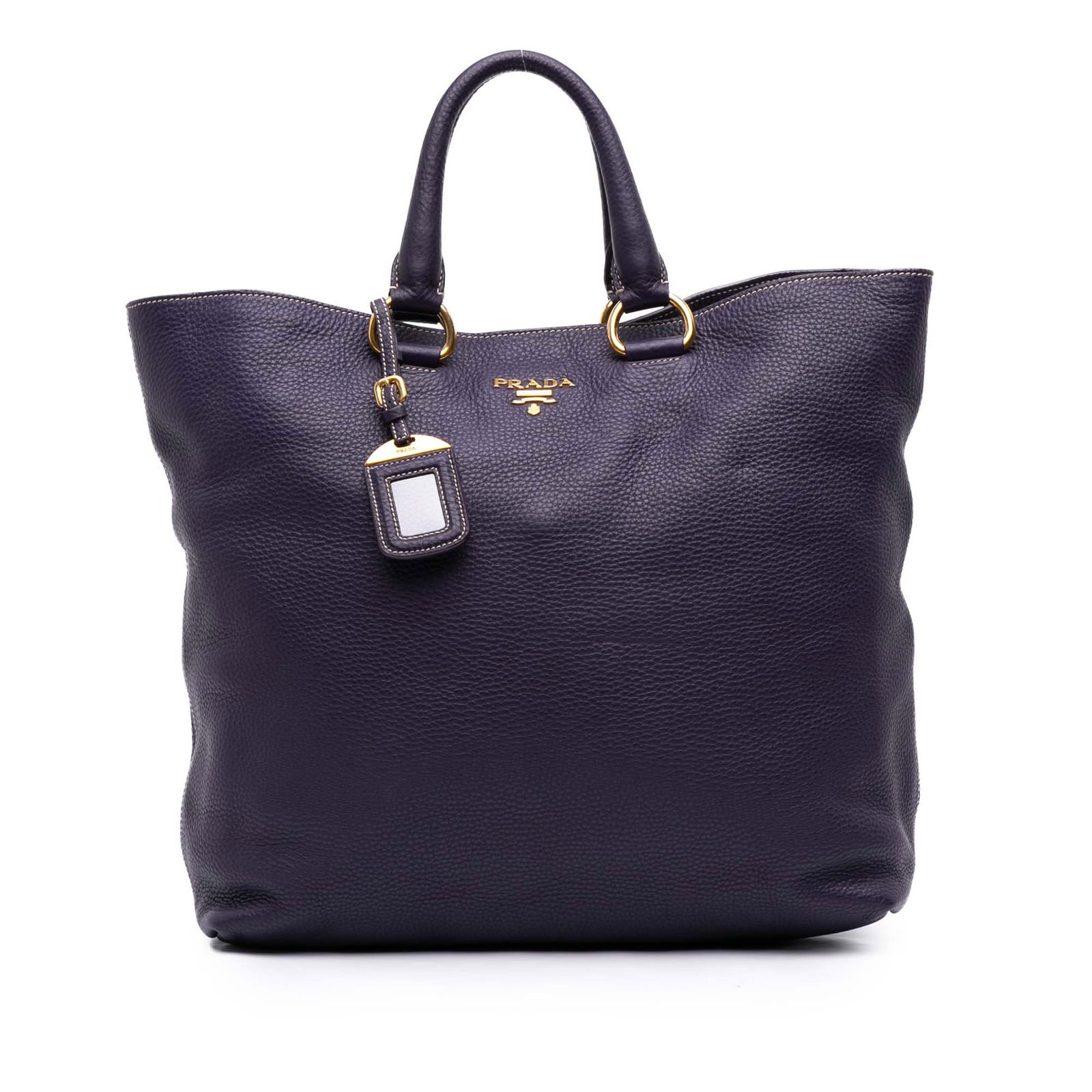 Prada Vitello Daino Open Convertible Tote Purple Leather Bag: Prada Vitello Daino Open Convertible Tote Purple Leather Bag The Prada Vitello Daino Open Convertible Tote is a stylish and functional accessory crafted from premium leather. This spacious tote featur