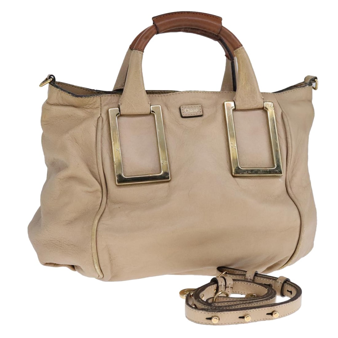 Chloe Etel 2-Way Leather Hand Bag Beige Gold Made in Italy: Chloe Etel 2-Way Leather Hand Bag Beige Gold Made in Italy This Chloe Etel Hand Bag is a stylish and versatile accessory crafted from high-quality leather. The elegant beige and gold color combination