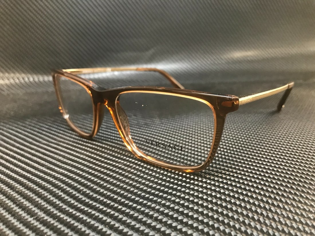 Versace VE3301 5028 Transparent Brown Rectangle Eyeglasses 54mm with Authenticity: Versace VE3301 5028 Transparent Brown Rectangle Eyeglasses 54mm with Authenticity Enhance your eyewear collection with these stylish Versace VE3301 5028 eyeglasses. Featuring a sophisticated transpare