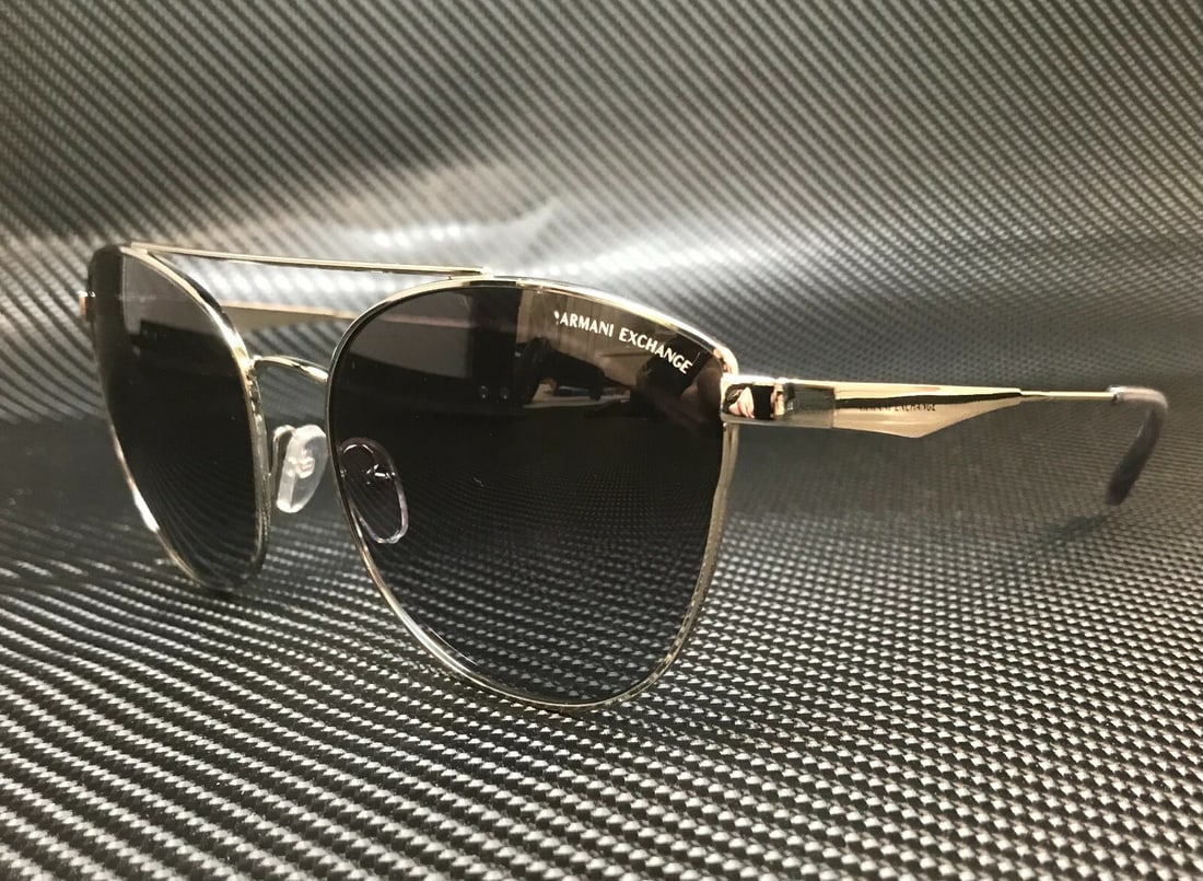 Armani Exchange AX2032S 61168G Silver Cat Eye Sunglasses 57mm: Armani Exchange AX2032S 61168G Silver Cat Eye Sunglasses 57mm Elevate your style with these stunning Armani Exchange AX2032S 61168G Women's Sunglasses, featuring a fashionable cat-eye design. The slee