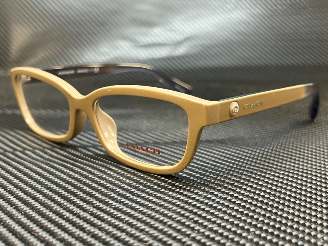 Coach HC6147U 5589 Women's Honey Rectangle Eyeglasses with Case: Coach HC6147U 5589 Women's Honey Rectangle Eyeglasses with Case Introducing the Coach HC6147U 5589 women's eyeglasses, a stylish accessory designed to enhance your look. These rectangular eyeglasses f