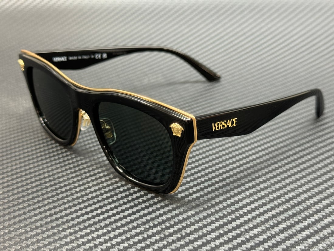 Versace VE2272 GB1 87 Black Grey 53mm Sunglasses with Authenticity Certificate: Versace VE2272 GB1 87 Black Grey 53mm Sunglasses with Authenticity Certificate Elevate your accessory game with these stylish Versace VE2272 GB1 87 sunglasses. Featuring a sleek black frame complement