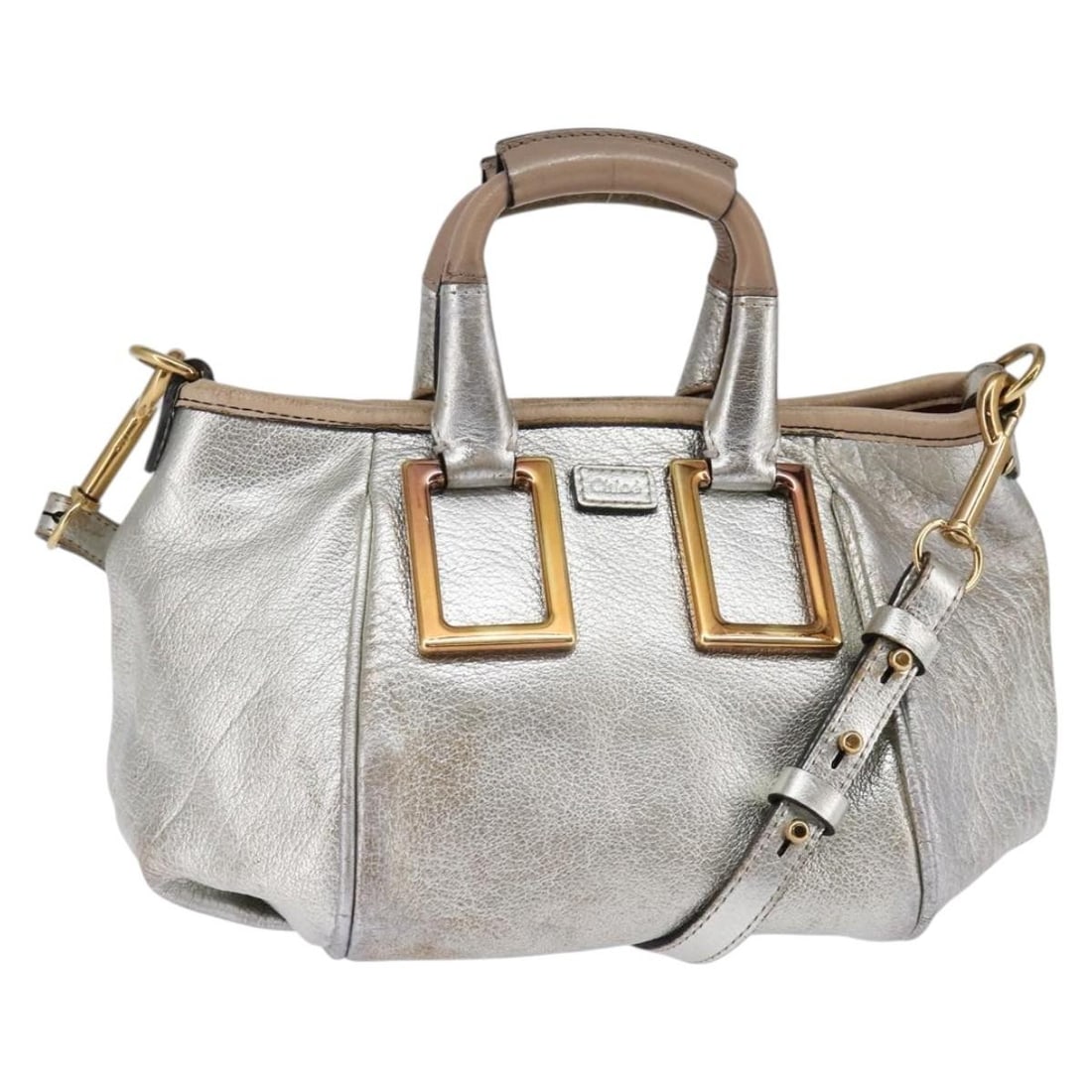 Chloe Etel Leather Hand Bag Silver Gold 2-Way Auth BA7071: Chloe Etel Leather Hand Bag Silver Gold 2-Way Auth BA7071 The Chloe Etel Hand Bag is a stunning accessory crafted from high-quality leather, featuring an elegant silver and gold exterior. This versati