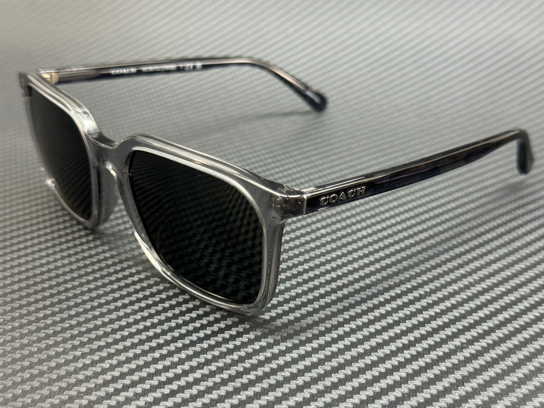 COACH HC8411U 584987 Transparent Grey 55mm Men's Sunglasses: COACH HC8411U 584987 Transparent Grey 55mm Men's Sunglasses Elevate your style with these COACH HC8411U 584987 Sunglasses, designed for men. Featuring a sleek transparent grey frame and grey lenses, t