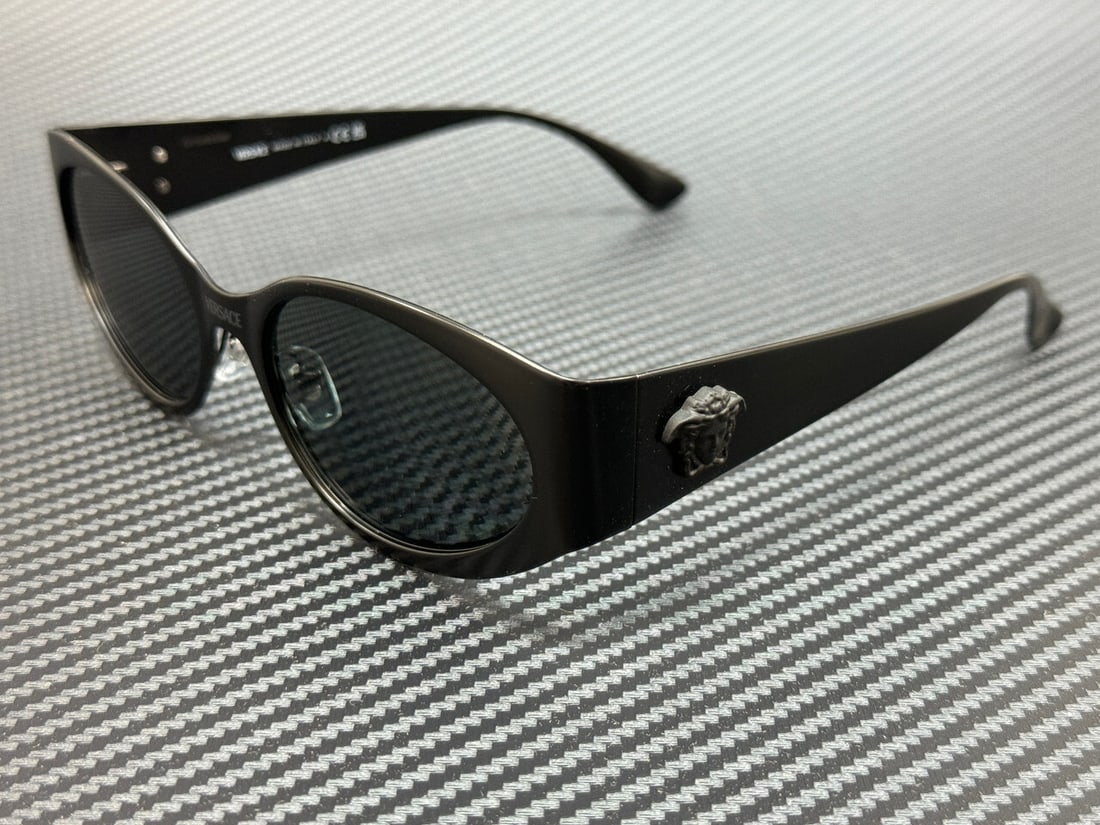 Versace VE2263 126187 Matte Black Women's Sunglasses with Dark Grey Lenses: Versace VE2263 126187 Matte Black Women's Sunglasses with Dark Grey Lenses Discover the elegance of Versace with the VE2263 126187 sunglasses. These stylish women's sunglasses feature a matte black fr