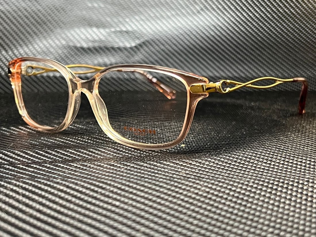 COACH HC6172 5640 Women's Gradient Peach Eyeglasses with Clear Lenses: COACH HC6172 5640 Women's Gradient Peach Eyeglasses with Clear Lenses Elevate your style with these COACH HC6172 5640 eyeglasses featuring a chic gradient transparent peach frame that perfectly comple