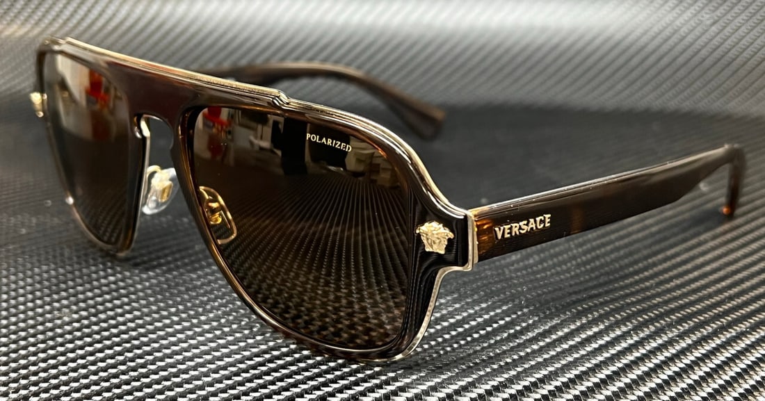 Versace VE2199 1252LA Brown Orange Polarized 56mm Men's Sunglasses: Versace VE2199 1252LA Brown Orange Polarized 56mm Men's Sunglasses Elevate your style with these Versace VE2199 sunglasses. Featuring a striking brown frame complemented by vibrant orange polarized le