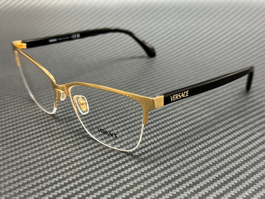 Versace VE1304 1002 Gold Black Men's Eyeglasses with Authenticity Certificate: Versace VE1304 1002 Gold Black Men's Eyeglasses with Authenticity Certificate Introducing the Versace VE1304 1002 Eyeglasses, a perfect blend of luxury and style. These eyeglasses feature a striking g