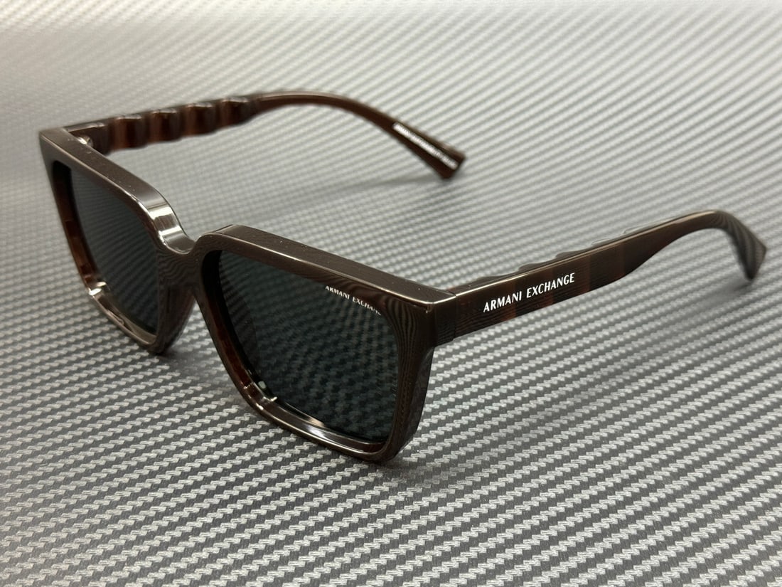 Armani Exchange AX4147S 835887 Brown Grey 56mm Men's Sunglasses with Authenticity Certificate: Armani Exchange AX4147S 835887 Brown Grey 56mm Men's Sunglasses with Authenticity Certificate Elevate your style with these Armani Exchange AX4147S sunglasses. Featuring a transparent brown frame and