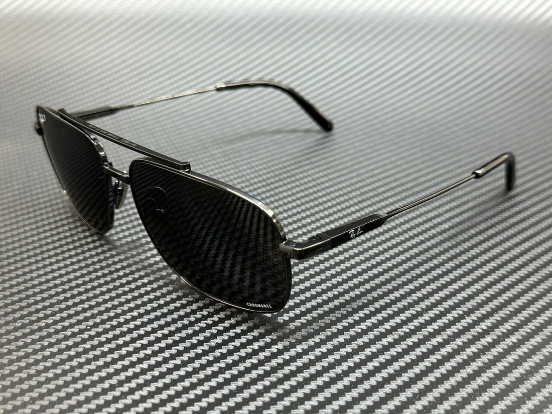 Ray-Ban RB8096 9267K8 Black Grey Polarized Sunglasses with Case: Ray-Ban RB8096 9267K8 Black Grey Polarized Sunglasses with Case Discover the stylish Ray-Ban RB8096 9267K8 sunglasses, featuring a sleek black frame and dark grey polarized lenses. Designed for comfor