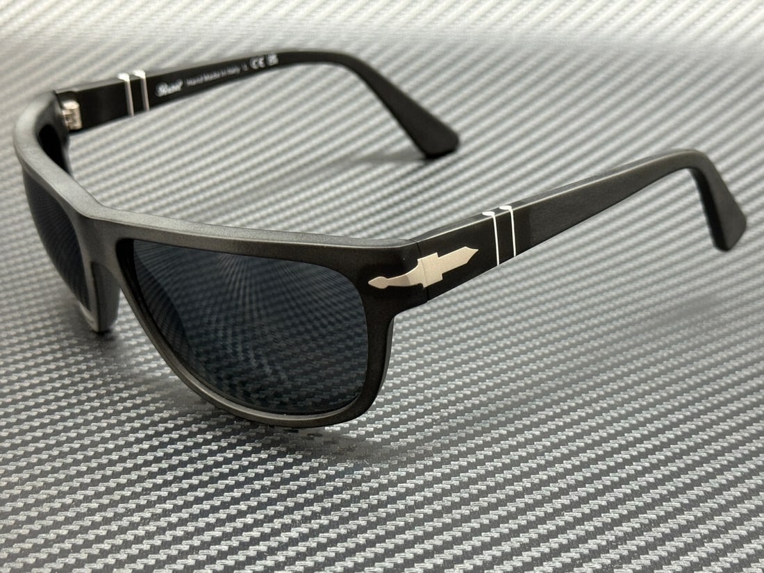 Persol PO3342S 900 R5 Matte Black Blue Sunglasses with Authenticity: Persol PO3342S 900 R5 Matte Black Blue Sunglasses with Authenticity Elevate your style with these Persol PO3342S 900 R5 Matte Black Blue men's sunglasses. Featuring a sleek matte black frame and strik