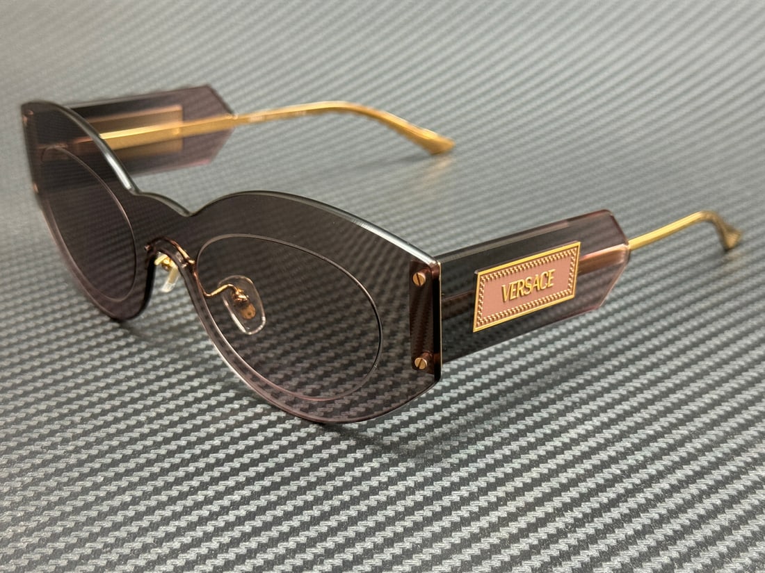 Versace VE2276 Gold Frame Pink Gradient Women's Sunglasses with Authenticity Certificate: Versace VE2276 Gold Frame Pink Gradient Women's Sunglasses with Authenticity Certificate Elevate your style with these stunning Versace VE2276 sunglasses. Crafted with a luxurious gold frame, these su