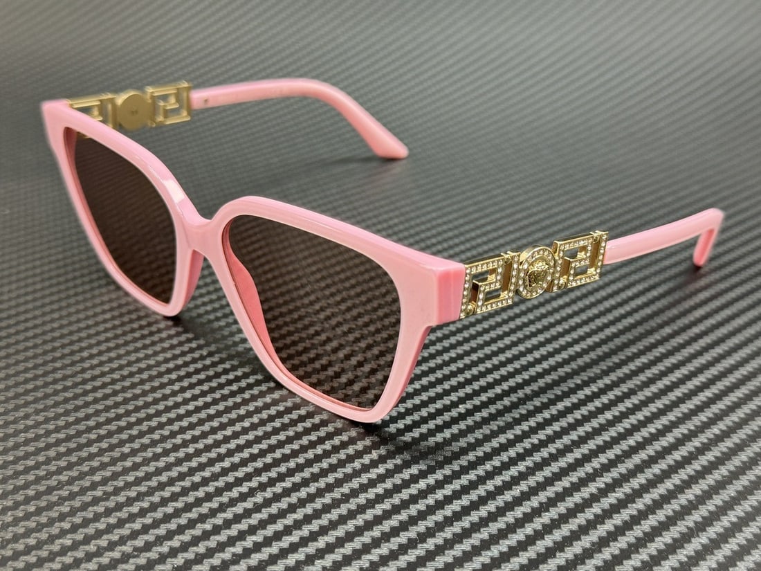 Versace VE4471B 5473 5 Pastel Pink Silver Mirror Women's Sunglasses: Versace VE4471B 5473 5 Pastel Pink Silver Mirror Women's Sunglasses Elevate your style with these stunning Versace VE4471B sunglasses. The frames showcase a beautiful pastel pink hue, perfectly comple