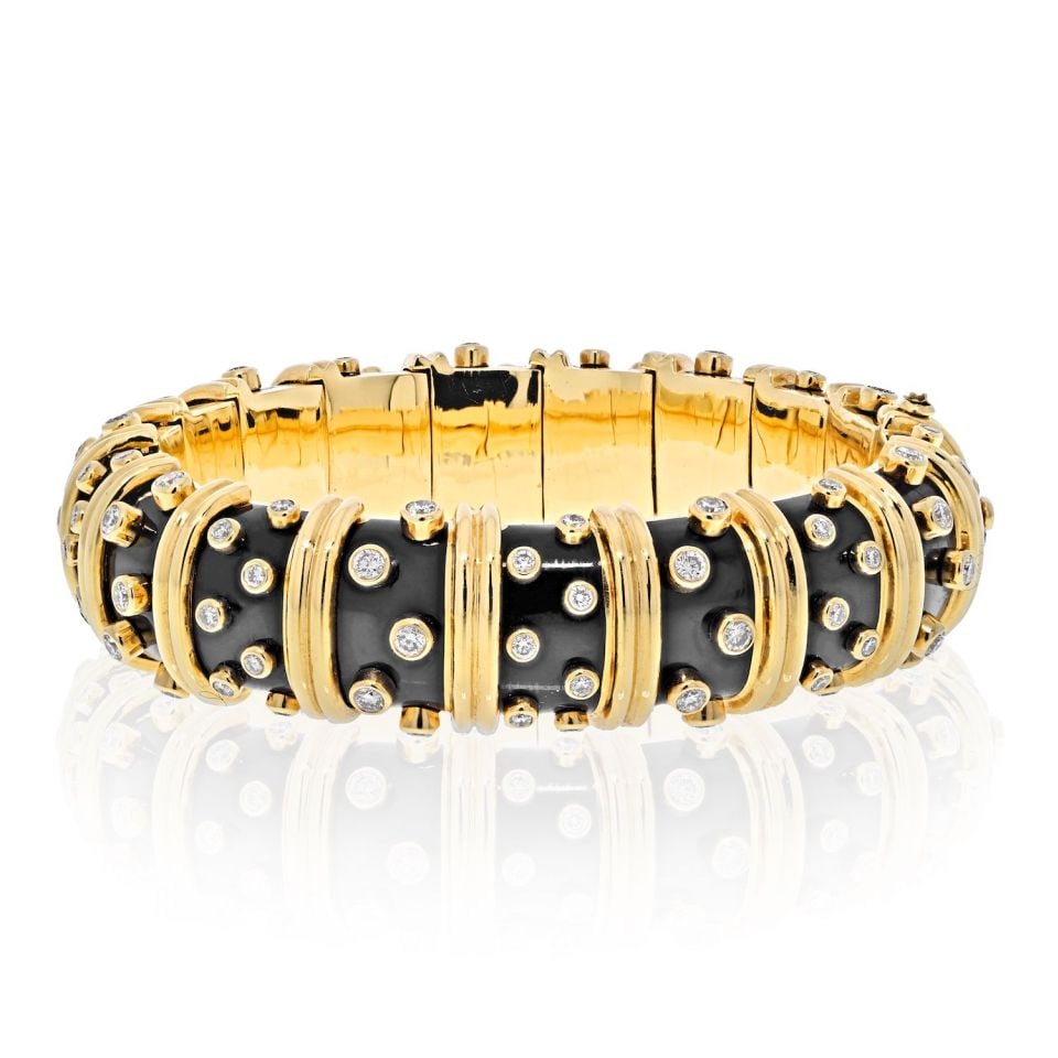 Tiffany & Co. Schlumberger Platinum 18K Gold Enamel Diamond Bracelet: Tiffany & Co. Schlumberger Platinum 18K Gold Enamel Diamond Bracelet This exquisite Tiffany & Co. Schlumberger bracelet combines elegance and luxury. Crafted from a harmonious blend of platinum and 18