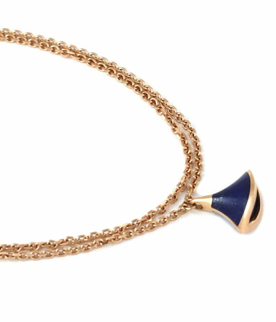 Bvlgari Diva's Dream 18k Rose Gold Lapis Lazuli Charm Bracelet: Bvlgari Diva's Dream 18k Rose Gold Lapis Lazuli Charm Bracelet Experience the elegance of the Bvlgari Diva's Dream Collection with this exquisite charm bracelet. Crafted from luxurious 18k rose gold,
