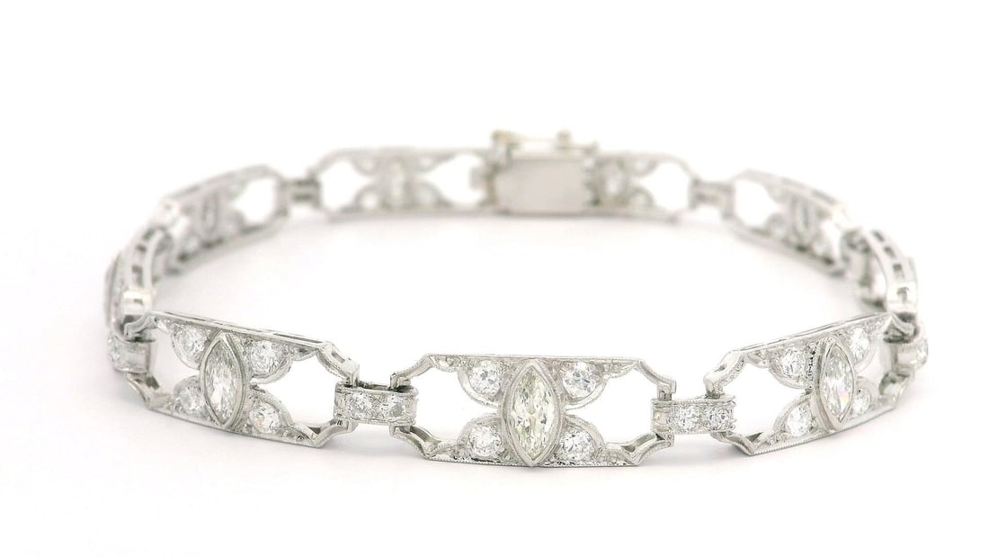 Antique Art Deco Platinum 3.20ctw Diamond Open Work Bracelet: Antique Art Deco Platinum 3.20ctw Diamond Open Work Bracelet This exquisite Antique Art Deco bracelet features a stunning array of natural genuine diamonds totaling approximately 3.20 carats. The desi